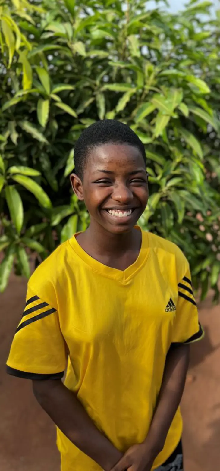 Reine fra Togo smiler