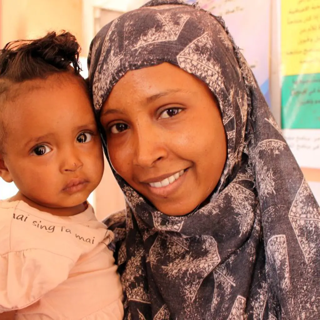 Mor og barn i Sudan