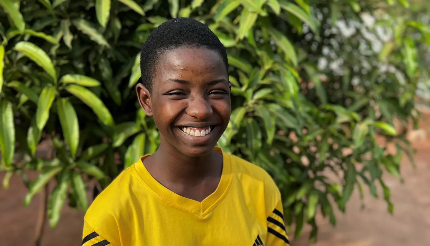 Reine fra Togo smiler