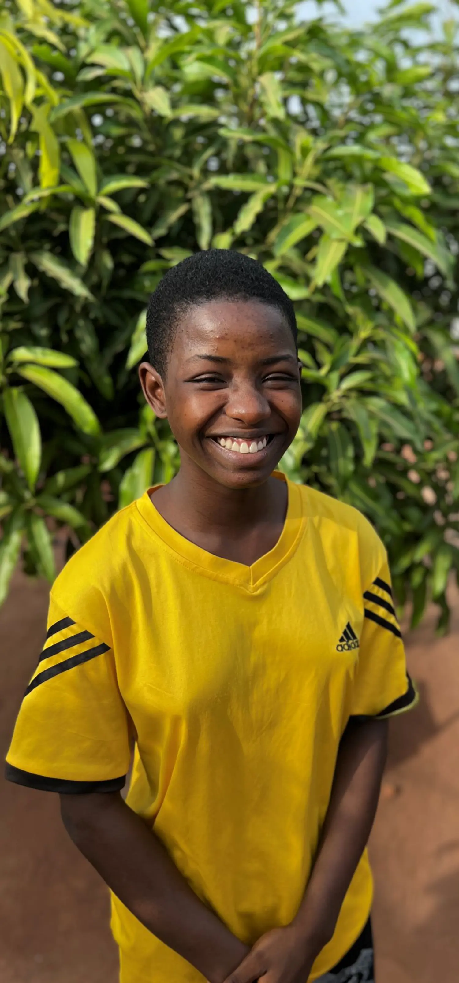 Reine fra Togo smiler